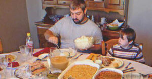 Read more about the article A lonely man gives a barefoot boy his turkey. A year later, they are all together for Thanksgiving.